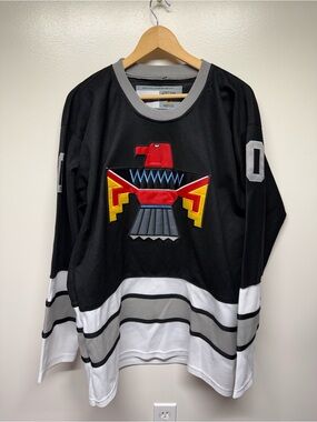 CCM Black, White and Gray Hockey Jersey with Colorful Thunderbird Patch